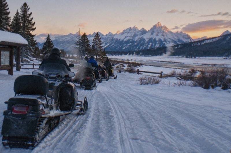 Snowmobiles at the Turpin Meadow trailhead near Jackson Hole in winter
